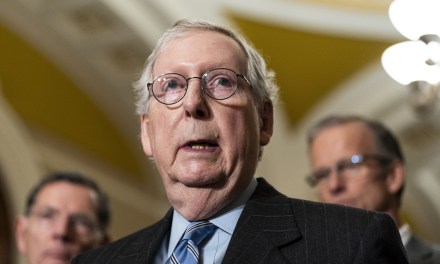 Mitch McConnell freezes at start of Senate GOP leadership press conference and is escorted to the side by his colleagues.