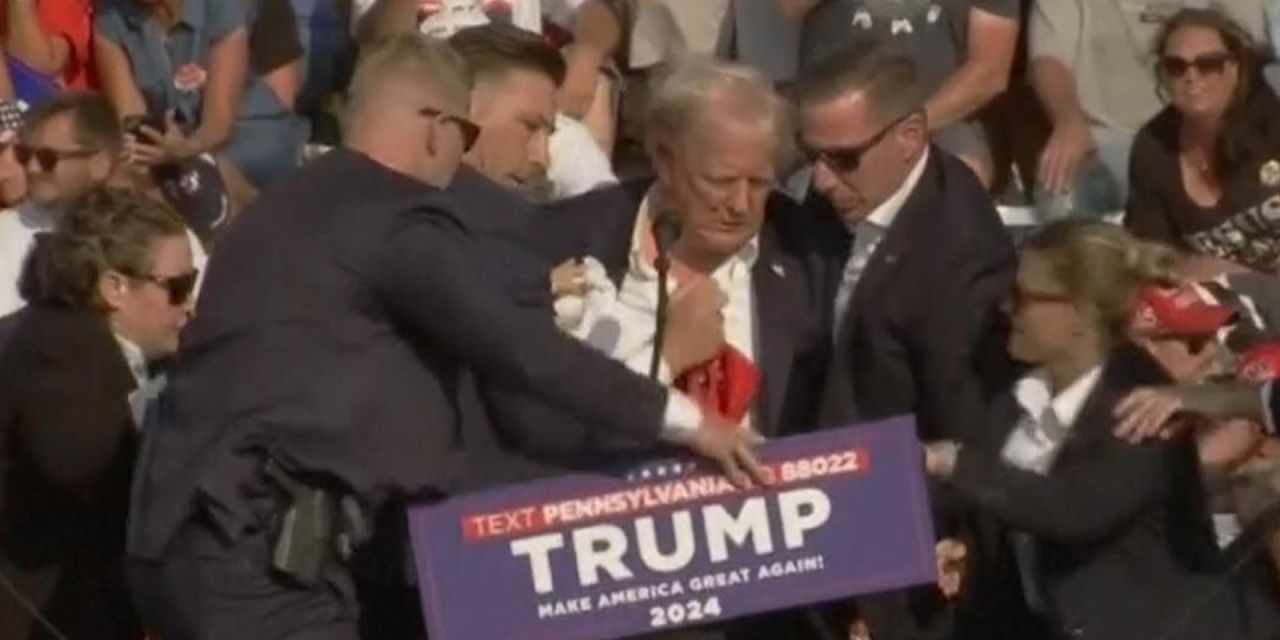 [VIDEO] TRUMP HIT BY GUN FIRE AT RALLY, BLEEDING – VIDEO AND PICTURES HERE